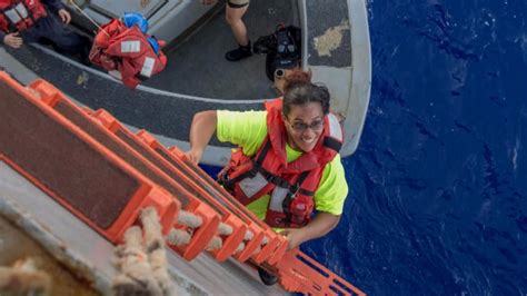 Man and woman rescued after getting trapped for 10 .